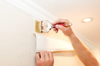 Pose de papier peint à Dolving — revêtements muraux et toiles de verre